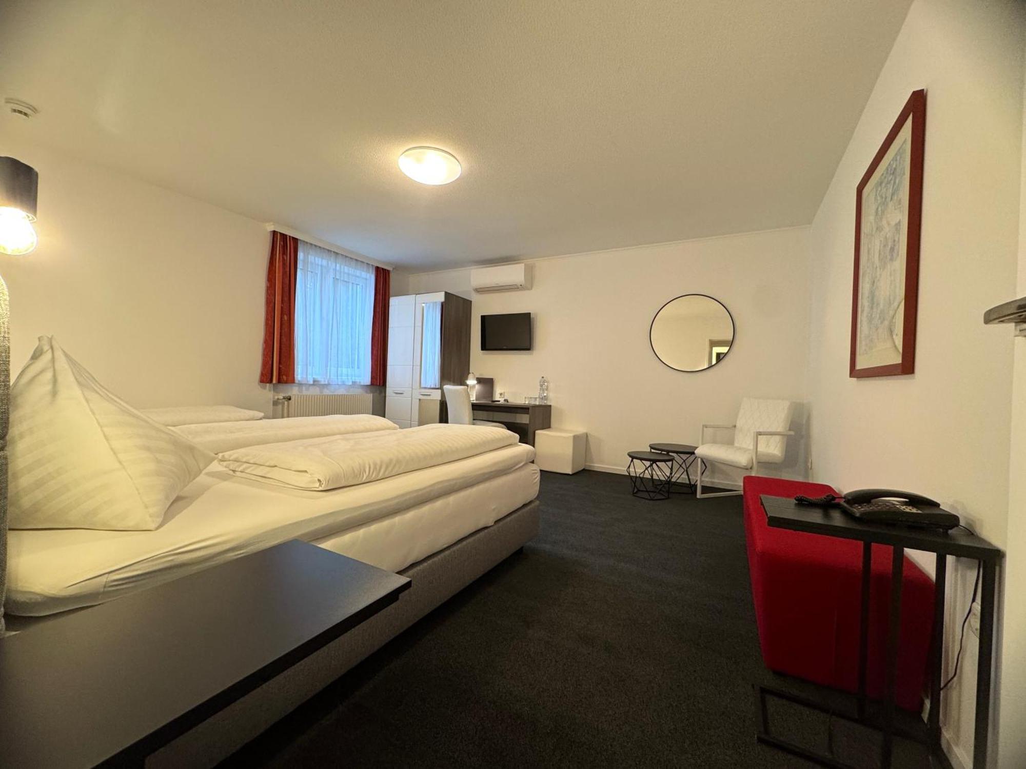 Dreibettzimmer